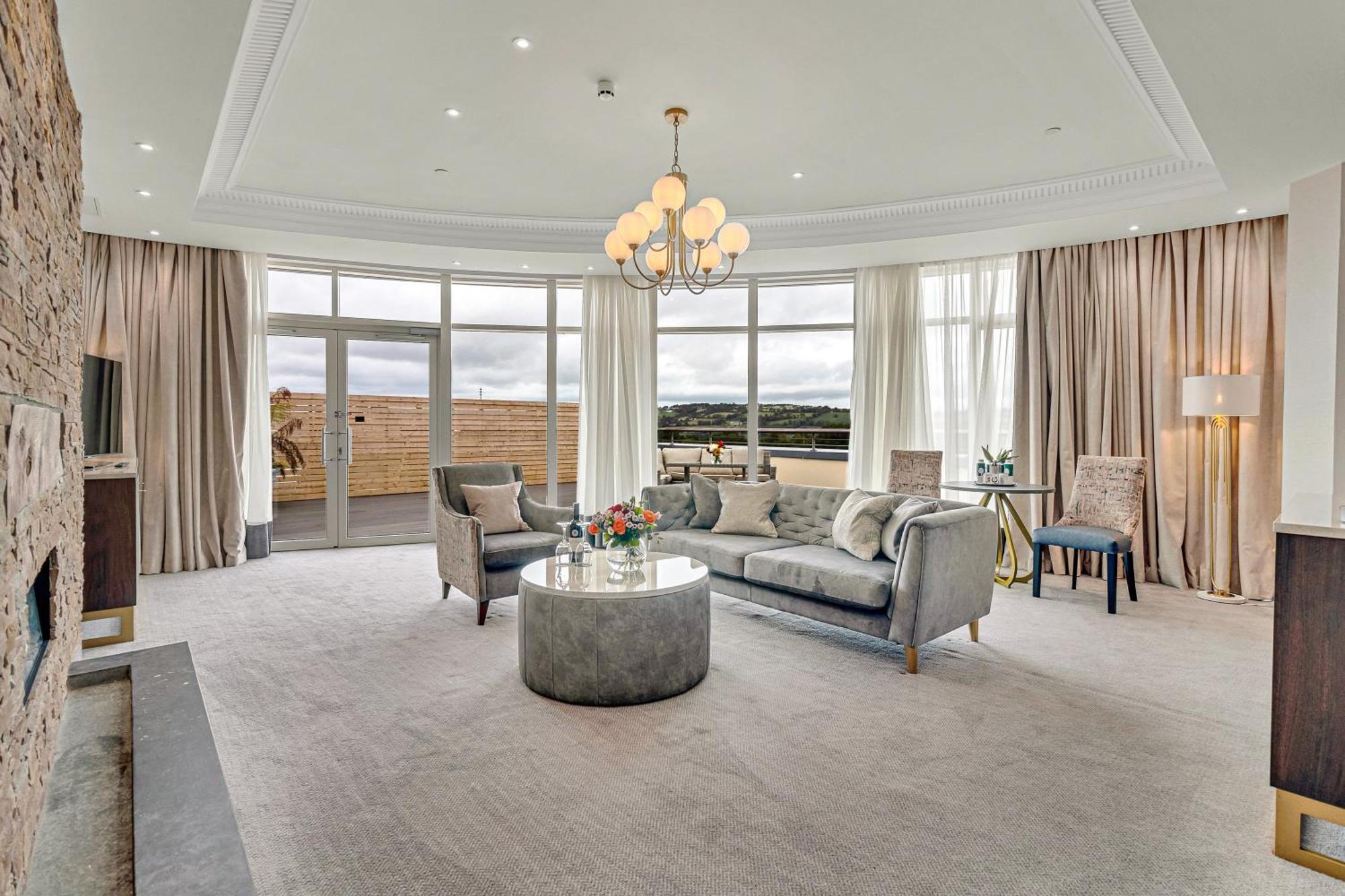 Fota Island Hotel And Spa Экстерьер фото The living room of a penthouse apartment at The Ivy Collection